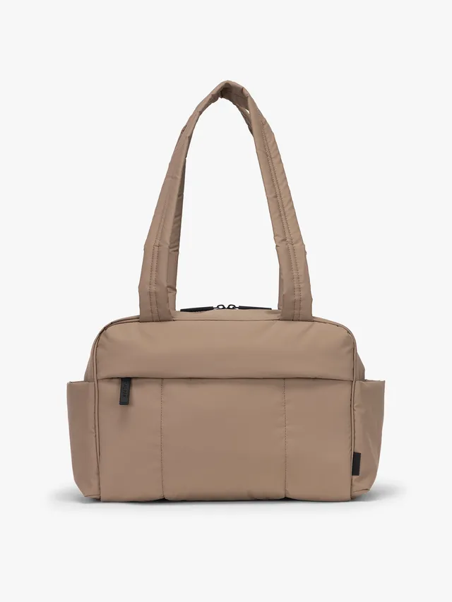 calpak-luka-mini-duffel-bag-lightweight-puffy-everyday-gym-commuter-bag-with-wat image 1