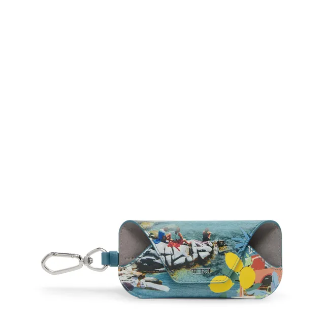 tumi-belden-sunglass-charm-with-pom-poms-clip-on-bag-accessory-holder image 1