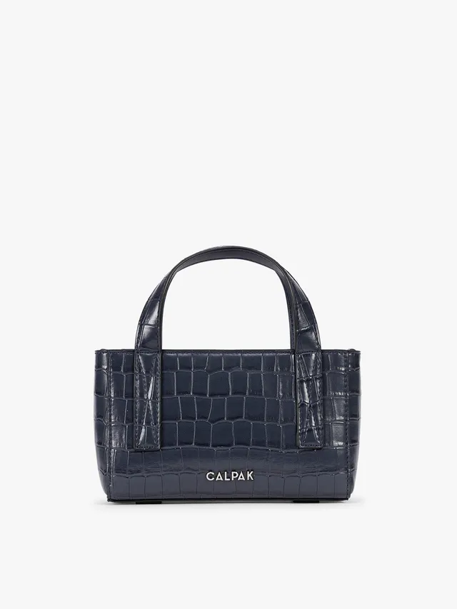 calpak-haven-mini-crossbody-bag-in-croc-embossed-finish-with-adjustable-strap image 1
