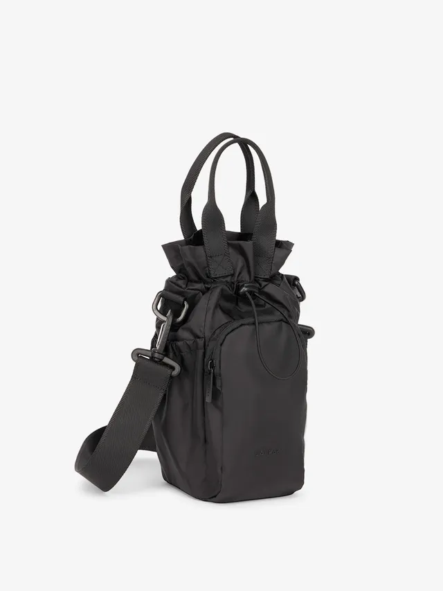 calpak-water-bottle-holder-hands-free-bottle-carrier-bag-with-exterior-pockets-a image 1