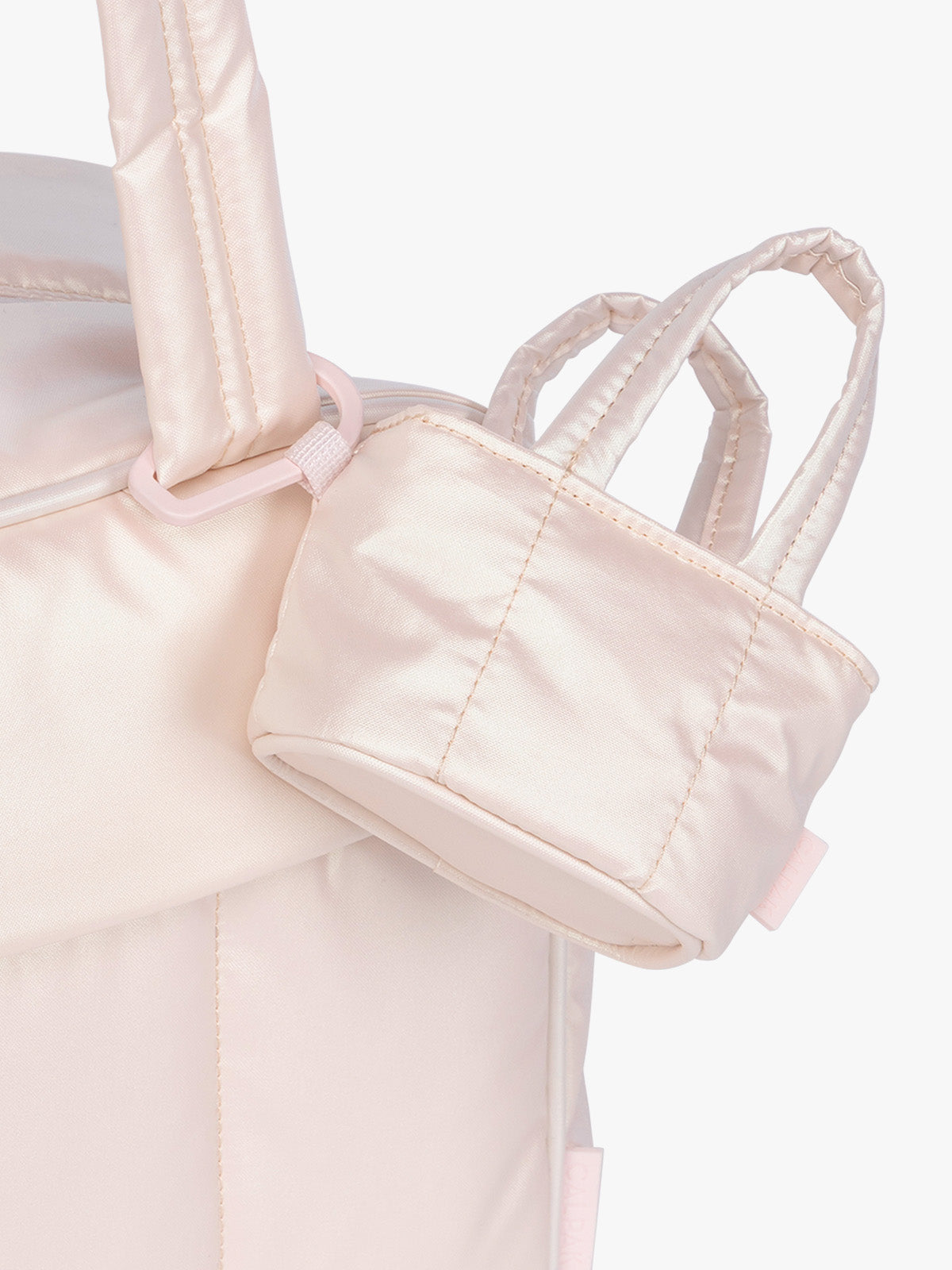 calpak-luka-tote-zip-bag-charm-puffy-mini-zip-pouch-with-water-resistant-lining image 6