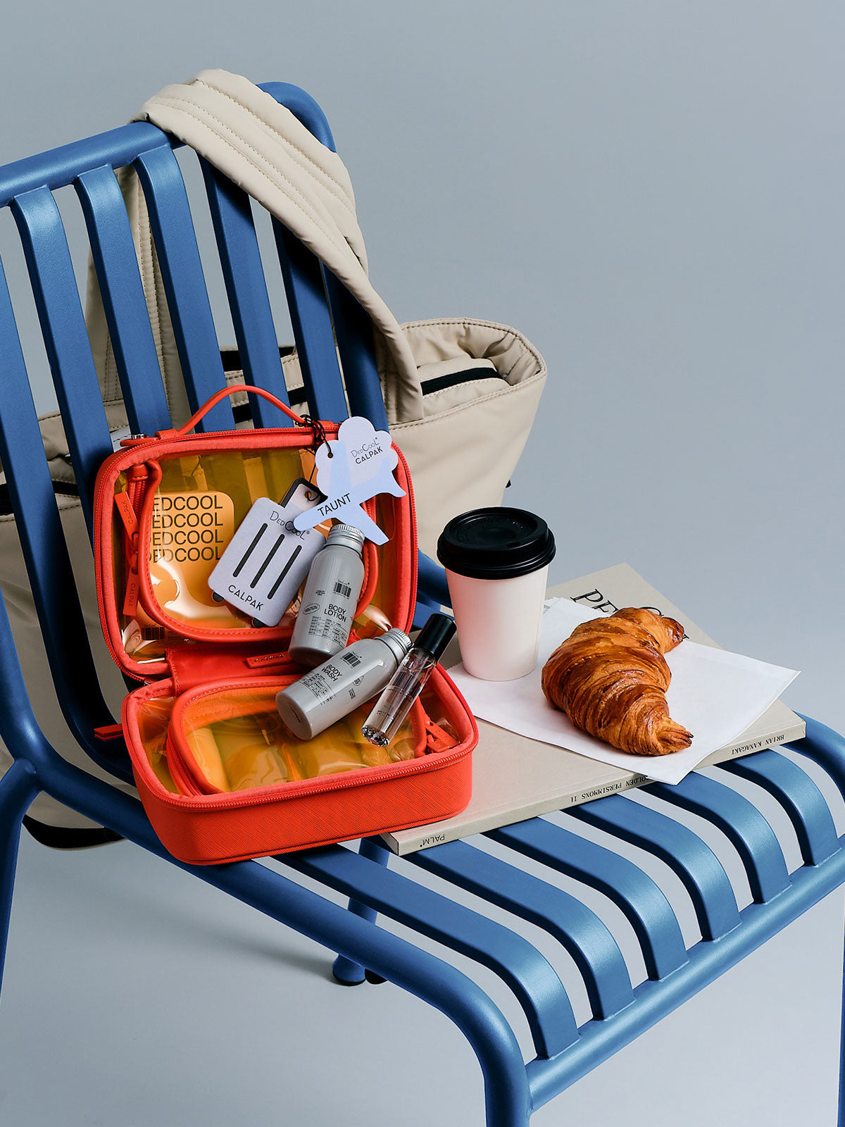 dedcool-x-calpak-boarding-bundle-limited-edition-papaya-clear-cosmetics-case-tra image 2
