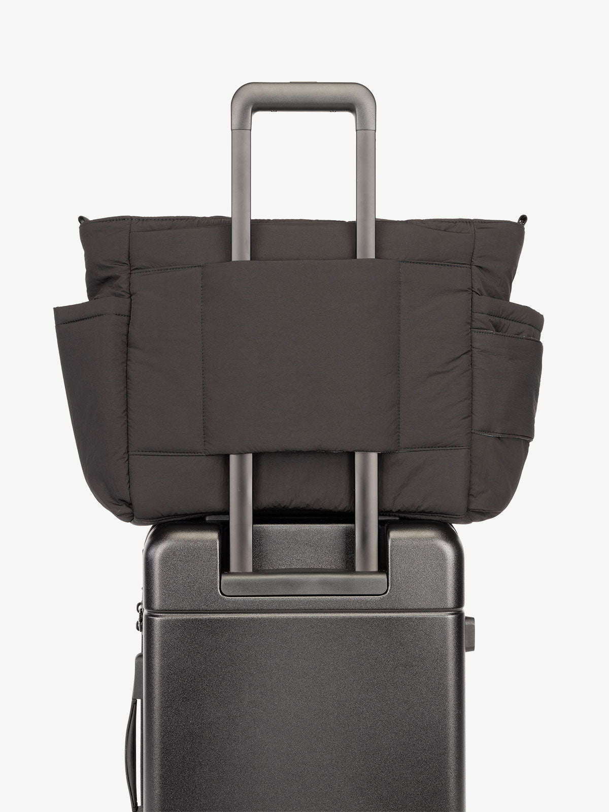 calpak-diaper-tote-bag-with-laptop-sleeve-insulated-bottle-pockets-luggage-sleev image 6