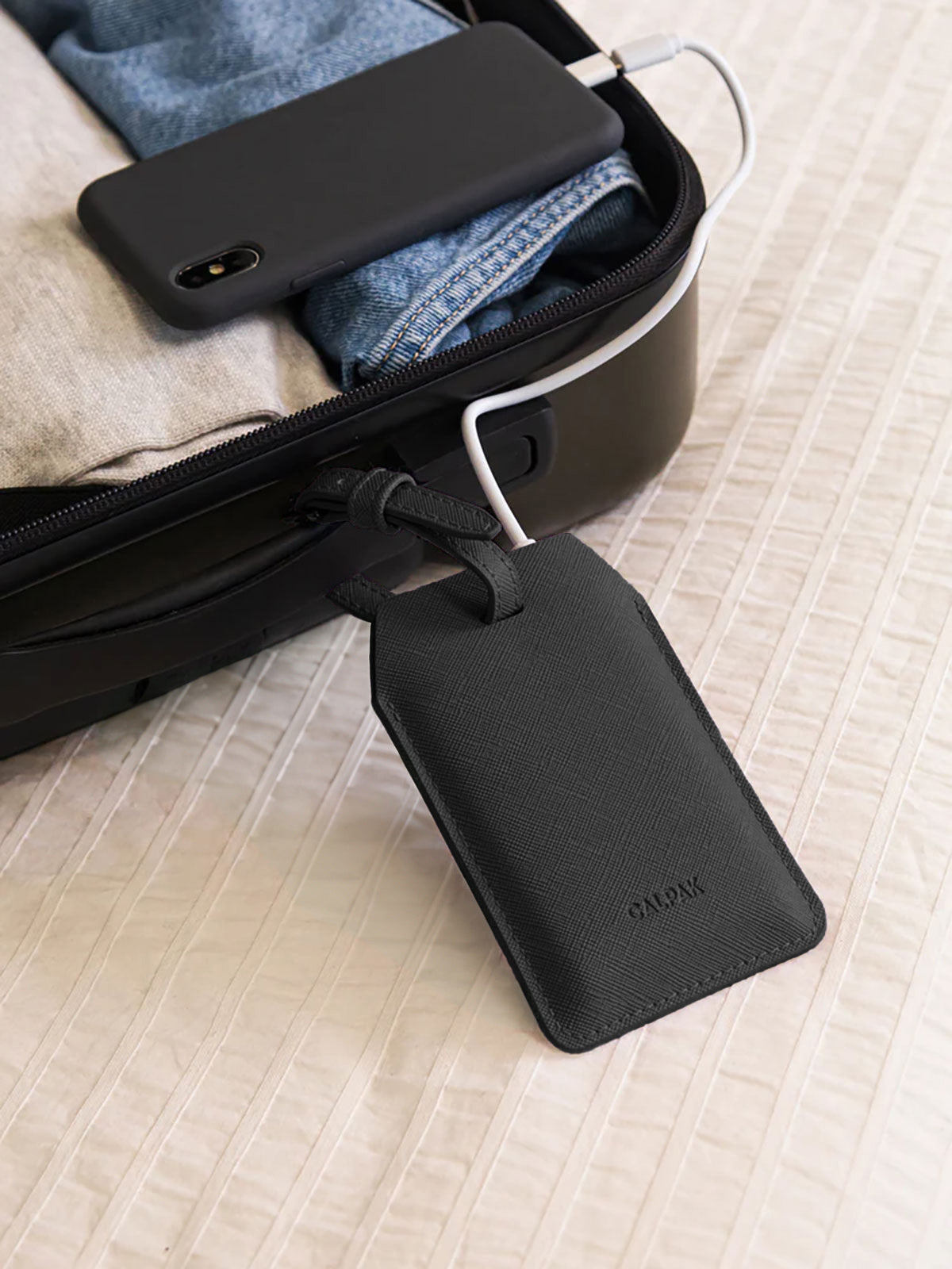 calpak-portable-luggage-tag-charger-tsa-friendly-travel-power-bank-with-usb-c-li image 2